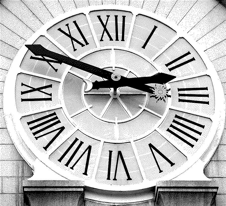 The face of a large clock with black Roman numerals on pale panels, ornate black hands and a small gold sun at the end of the minute hand, set in a round frame on a stone wall.