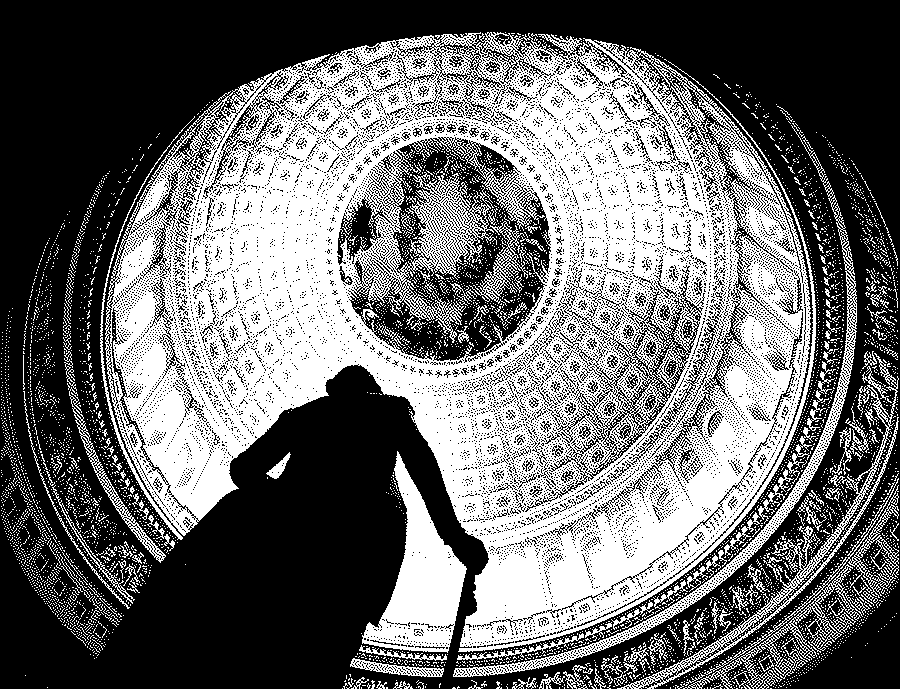 View upward into the dome of the US Capitol Rotunda: rings of coffered panels around a painted circular canopy, with the dark silhouette of a statue in the foreground.
